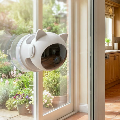 Cat-ear laser toy mounted on glass door overlooking garden — window-mount automatic cat laser toy