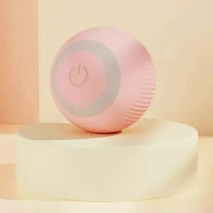 Pink electronic silicone covered ball showing on off switch