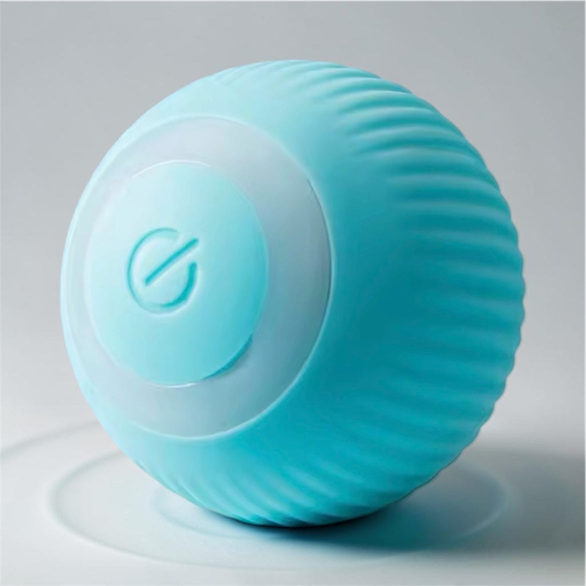 Teal ribbed automatic rolling ball toy with power button on grey background — USB rechargeable smart ball for cats and dogs